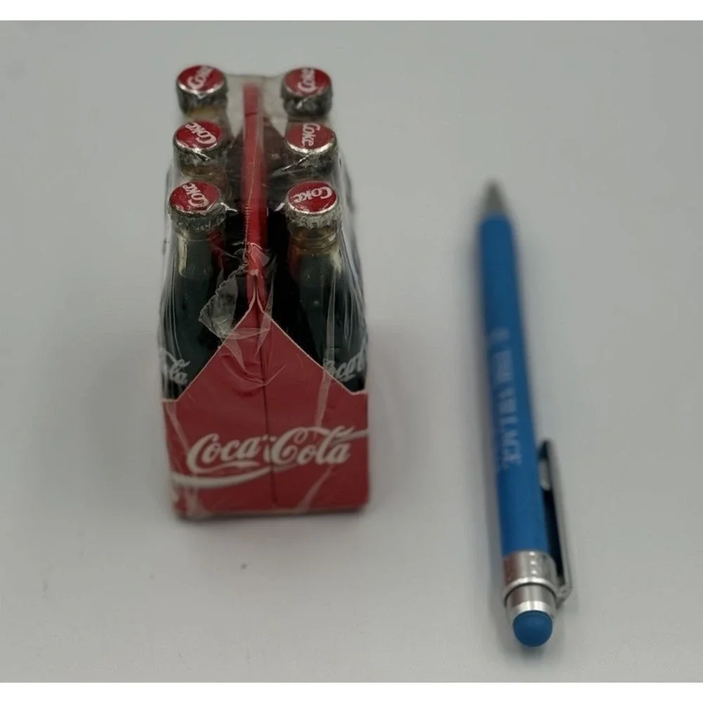 Vintage Miniature Six Pack of Glass Coca Cola Bottles In Paper Carrier Sealed